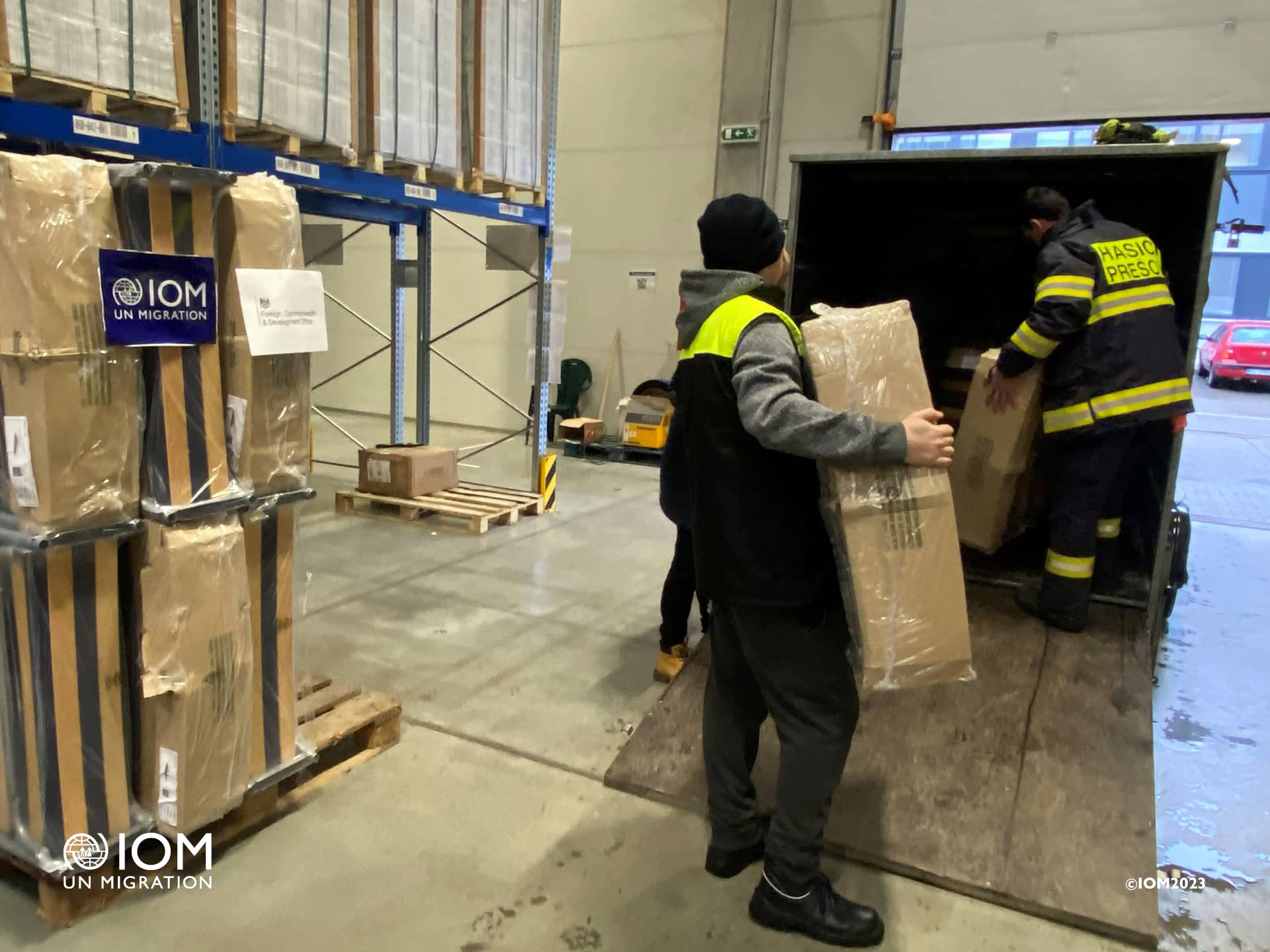 Volunteer Firefighters from Presov taking over IOM delivery of folding beds. Photo © International Organization for Migration (IOM) 2023.